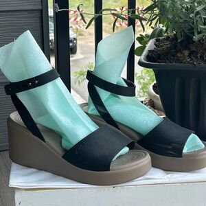 CROCS Black and Tan Wedge Sandals